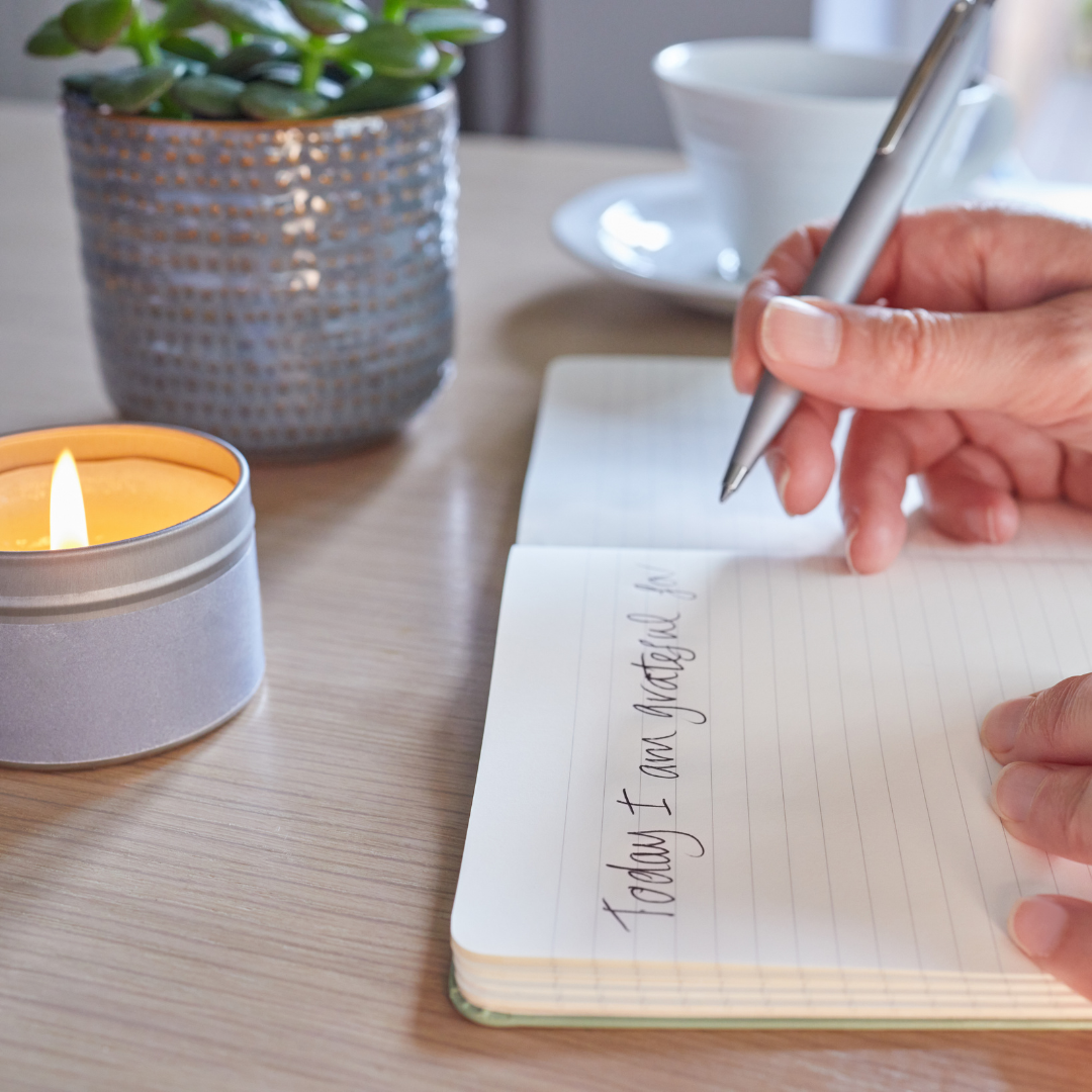 Woman gratitude journaling best ways to manifest