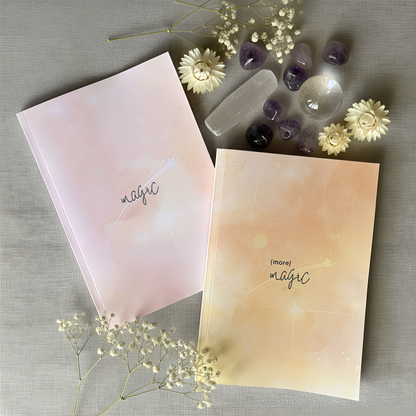 Flatlay of manifestation journals for beginners Magic and (more) Magic by Bliss&