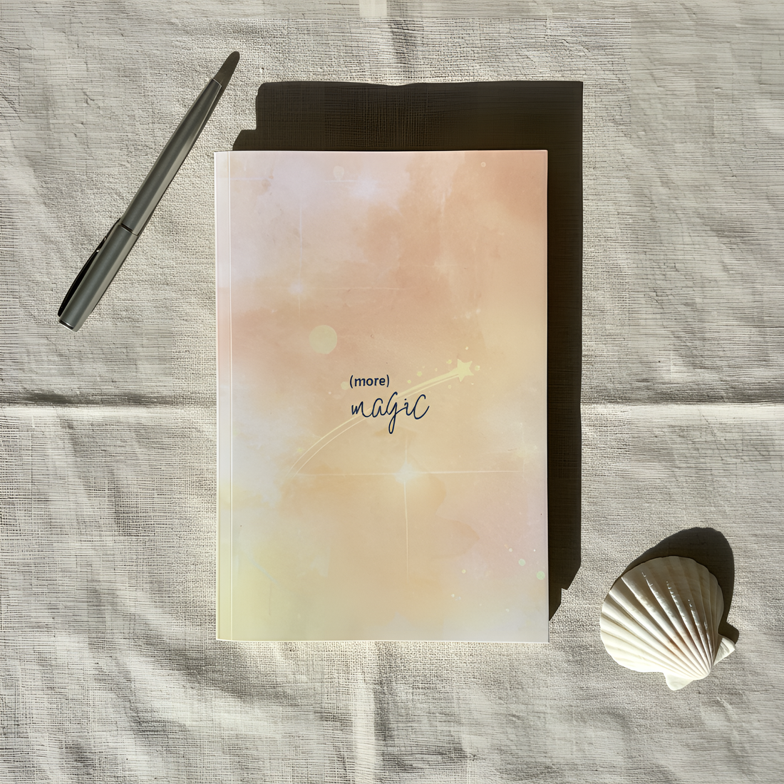 Manifestation Journal Cover flatlay (more) Magic with shell and pen